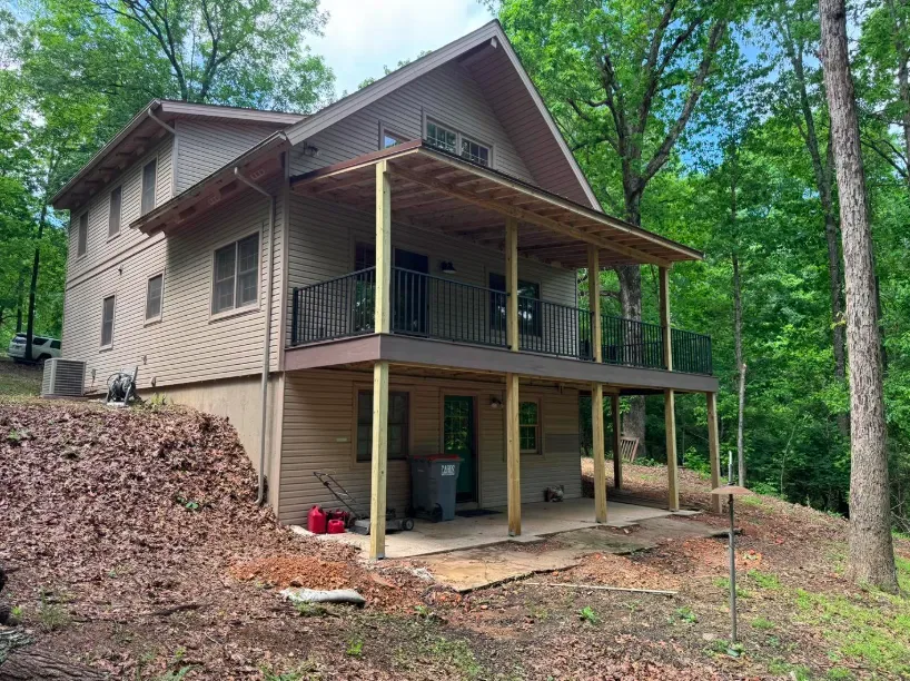 376 sq ft TimberTech composite deck with metal porch roof Fayetteville AR — JHG Contracting LLC