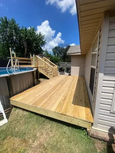 8x24 custom deck alongside pool — JHG Contracting LLC serving Lowell, AR