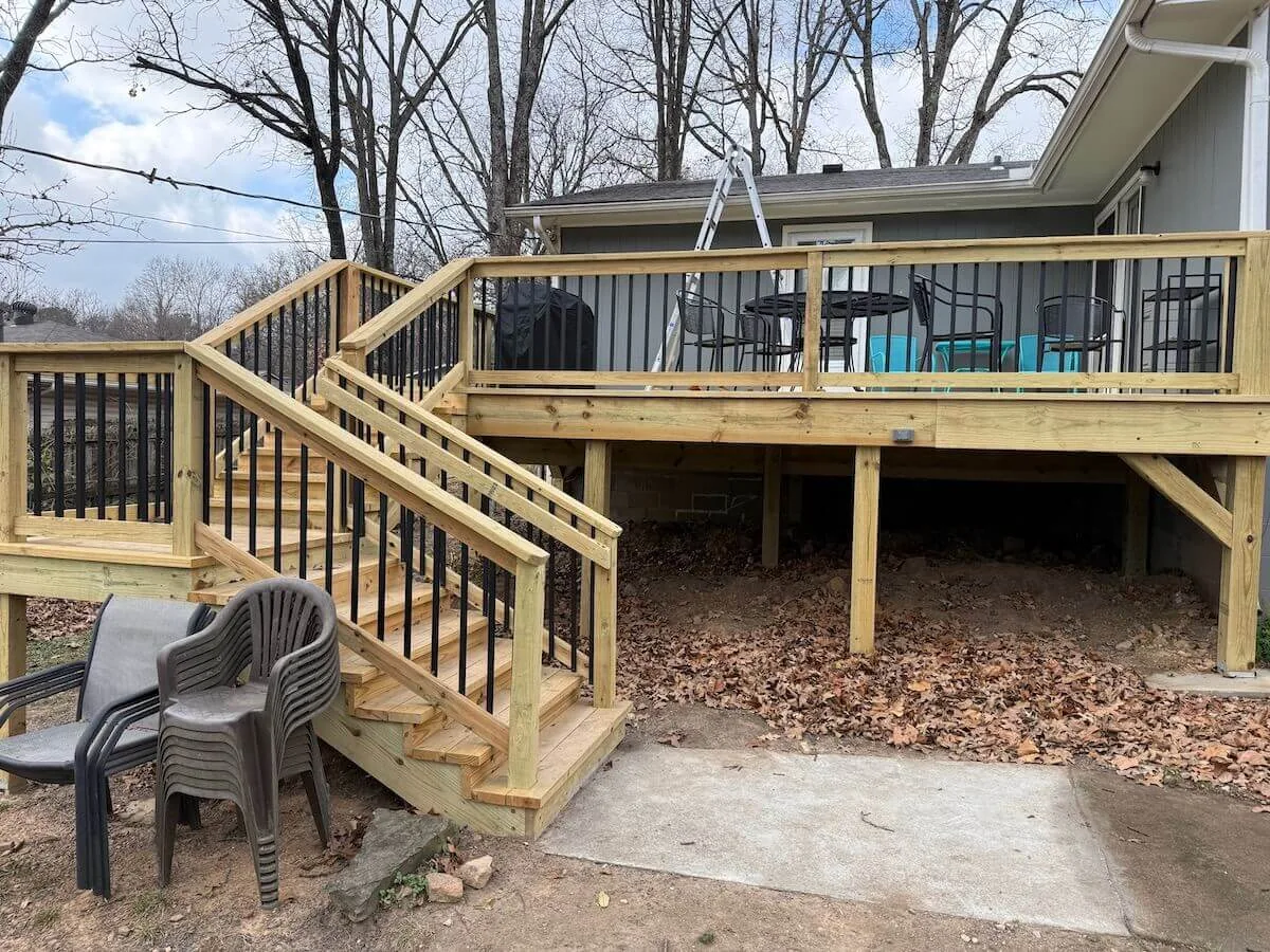 New wood deck with black balusters NWA Region — JHG Contracting LLC